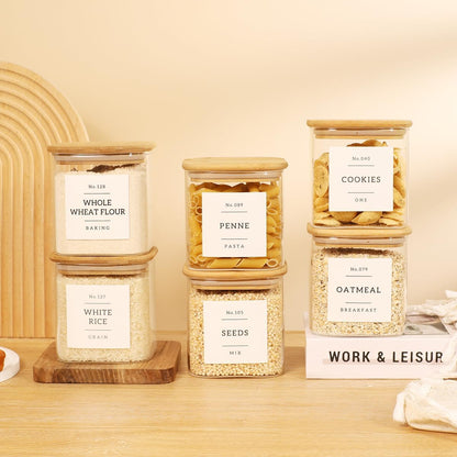 5 Pack Square Glass Pantry Storage Containers with 132 Kitchen Food Pantry Labels - Clear Glass Pantry Jars with Airtight Wood Bamboo Lids - Glass Canisters for Pasta, Cereal, Coffee, Flour, Sugar
