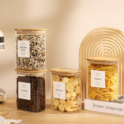 5 Pack Square Glass Pantry Storage Containers with 132 Kitchen Food Pantry Labels - Clear Glass Pantry Jars with Airtight Wood Bamboo Lids - Glass Canisters for Pasta, Cereal, Coffee, Flour, Sugar