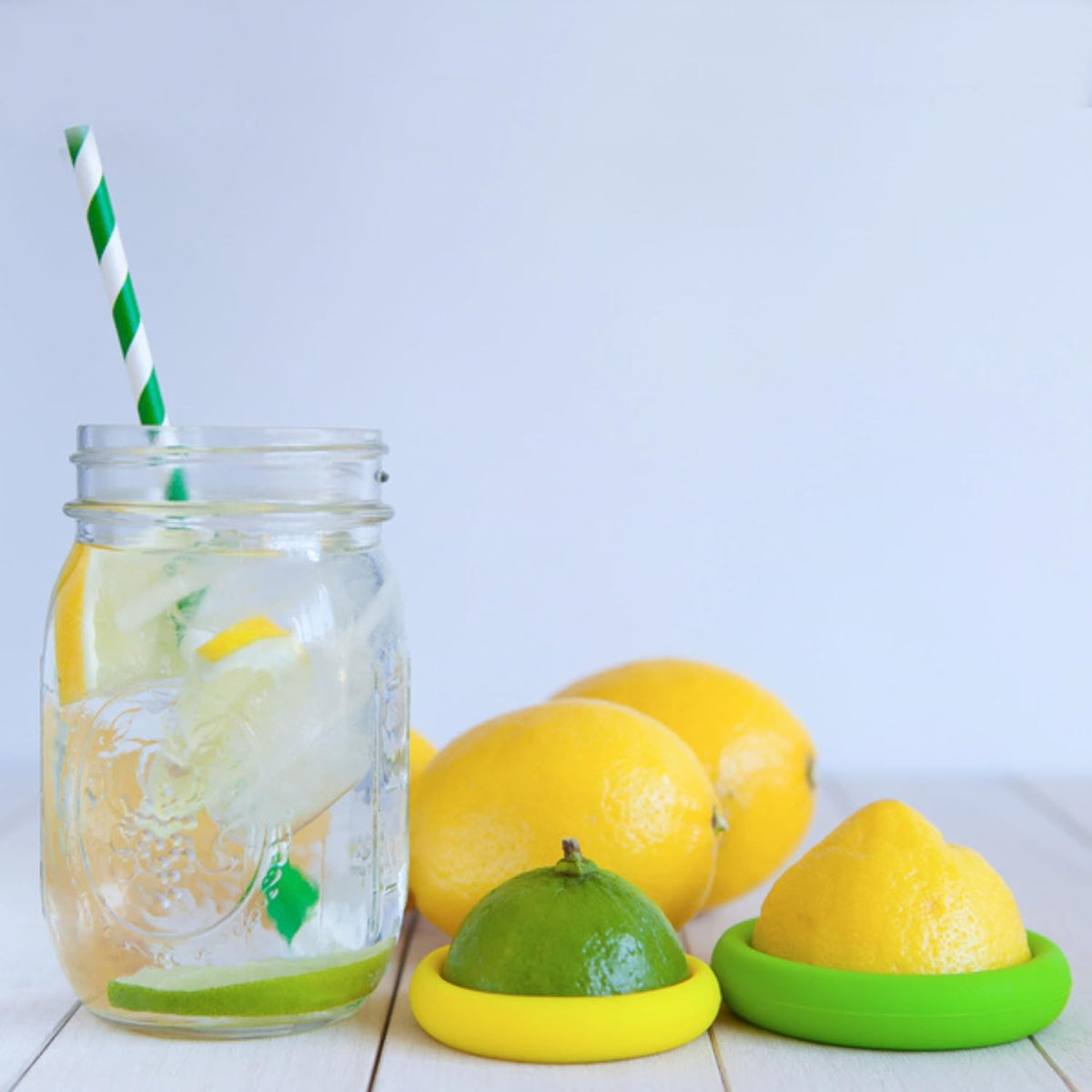 2pc Reusable Silicone Citrus Savers | BPA Free & Dishwasher Safe | Fruit Produce Storage for Orange, Lemon, Lime, Banana, Cans & More | 2 Pack Round, Forest Mint